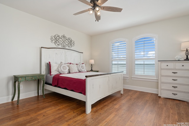 bedroom featuring ceiling fan and hardwood / wood-style floors