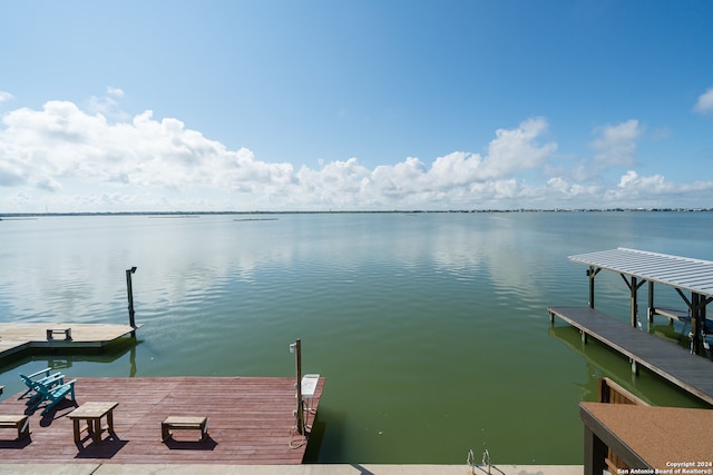 dock area featuring a water view