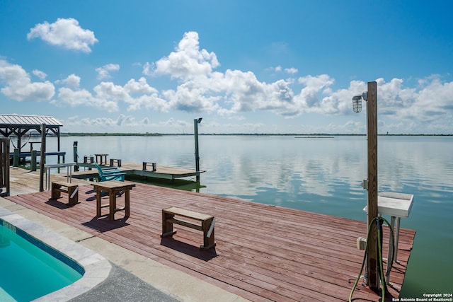 dock area with a water view