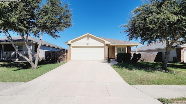 single story home with a garage and a front lawn