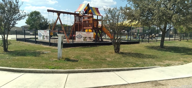 view of playground with a yard