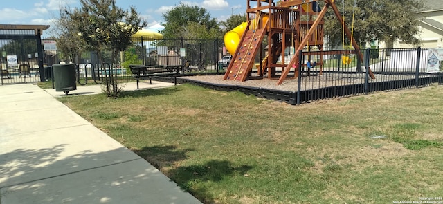 view of jungle gym with a yard