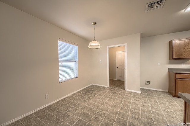 view of unfurnished dining area