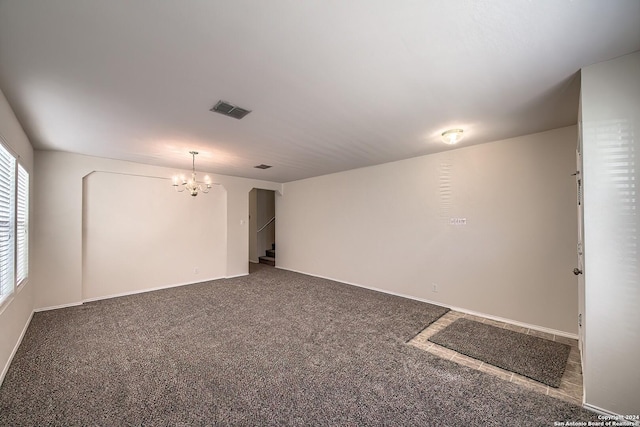 5823 Barton Holw, San Antonio, TX 78249 - unfurnished room featuring a chandelier, carpet flooring, stairs, and baseboards