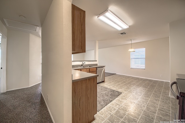 kitchen with dishwasher, range, sink, light carpet, and decorative light fixtures