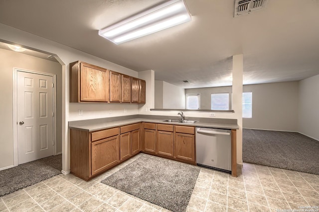 5823 Barton Holw, San Antonio, TX 78249 - kitchen with stainless steel dishwasher, a sink, light carpet, open floor plan, and baseboards