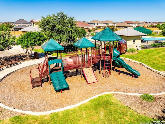 view of jungle gym with a yard