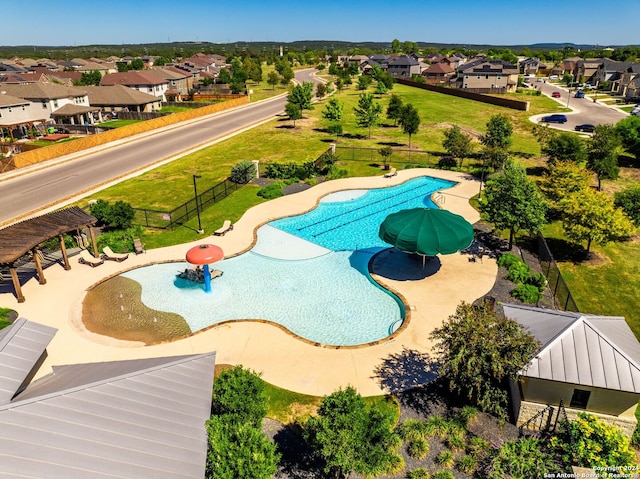 view of swimming pool featuring a patio and a gazebo