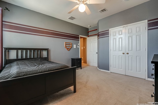 carpeted bedroom featuring ceiling fan