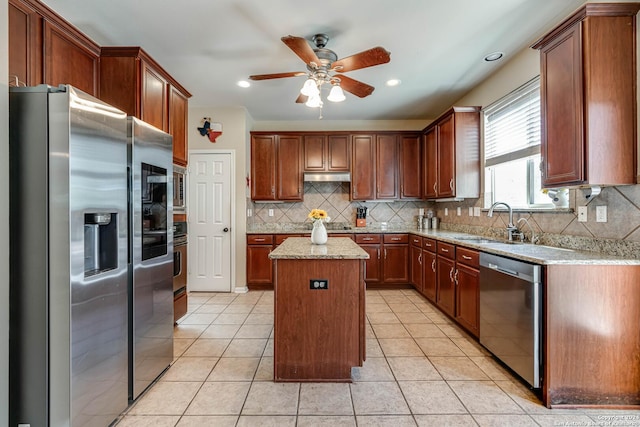3303 Cambria Way, San Antonio, TX 78251 - kitchen featuring a sink, appliances with stainless steel finishes, a center island, under cabinet range hood, and a ceiling fan