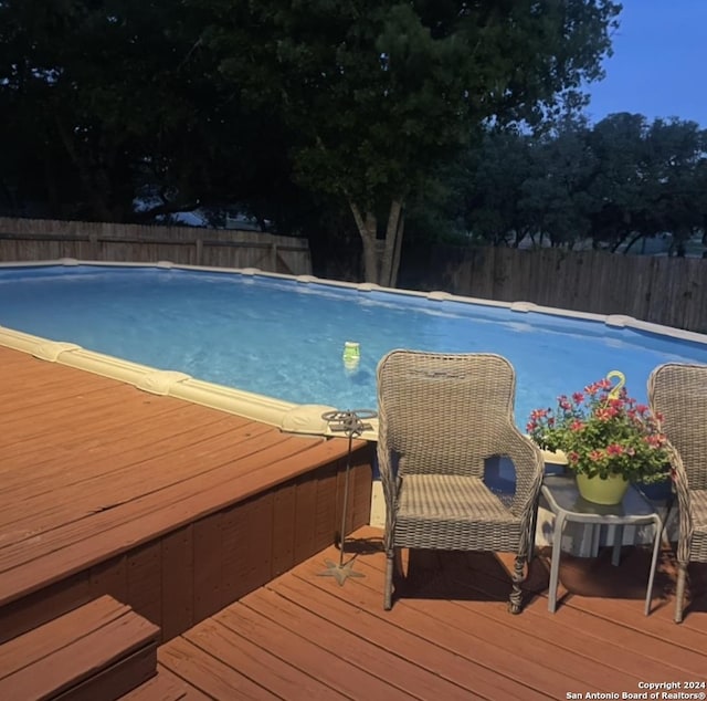3303 Cambria Way, San Antonio, TX 78251 - view of pool with a fenced in pool, a deck, and a fenced backyard