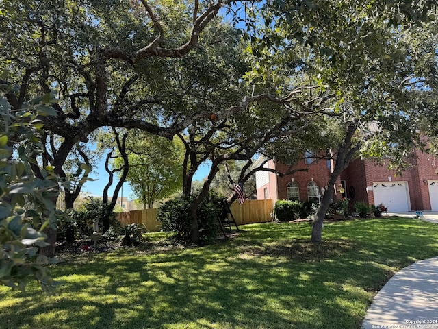 view of yard featuring a garage