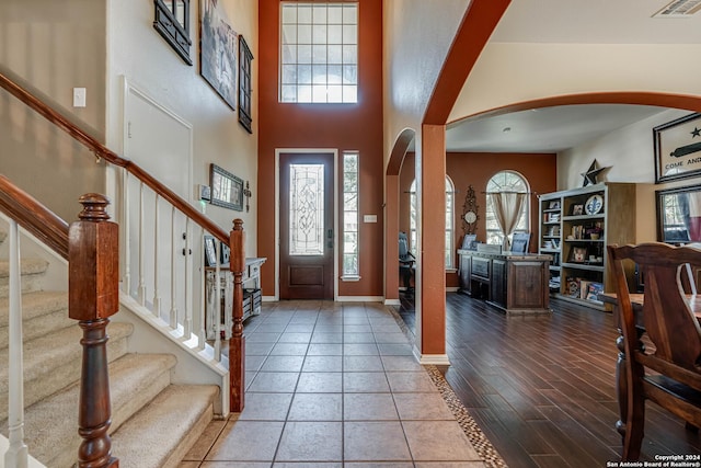 3303 Cambria Way, San Antonio, TX 78251 - foyer featuring arched walkways, visible vents, stairway, and a healthy amount of sunlight