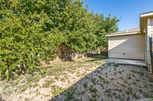 view of yard with a fenced backyard and a patio