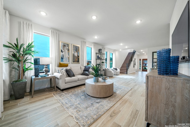 living room with light hardwood / wood-style flooring