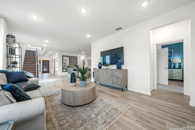 living room featuring light wood-type flooring