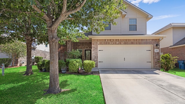 view of front facade featuring a garage and a front lawn