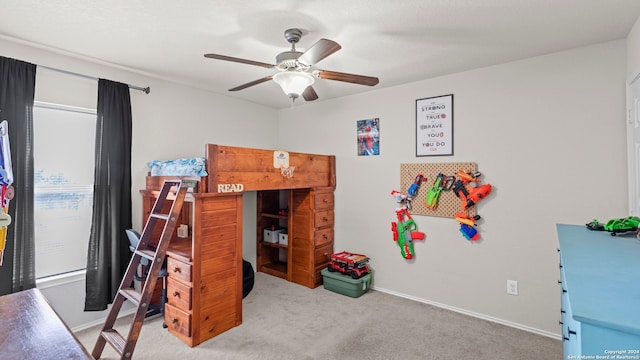 carpeted bedroom featuring ceiling fan