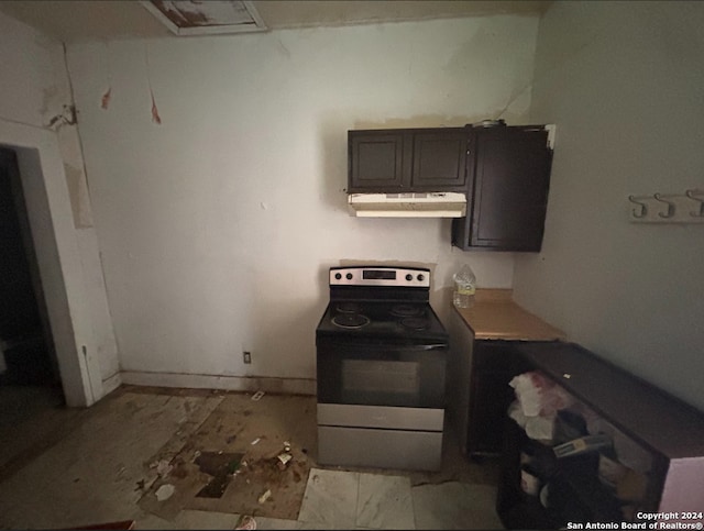 kitchen featuring white electric stove