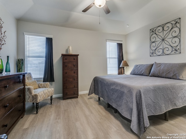 bedroom featuring ceiling fan and light wood-type flooring