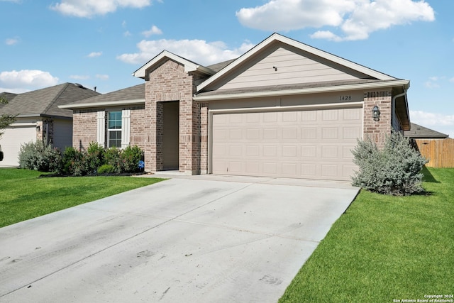 single story home with a garage and a front lawn