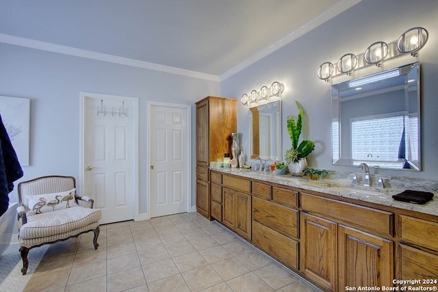 bathroom featuring ornamental molding, tile patterned floors, and vanity