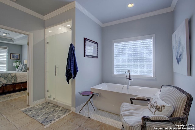 bathroom featuring independent shower and bath, crown molding, tile patterned flooring, and a healthy amount of sunlight