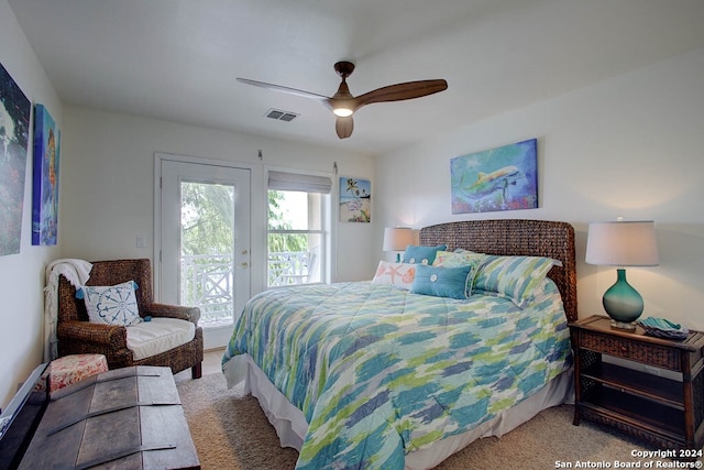 carpeted bedroom with access to outside and ceiling fan