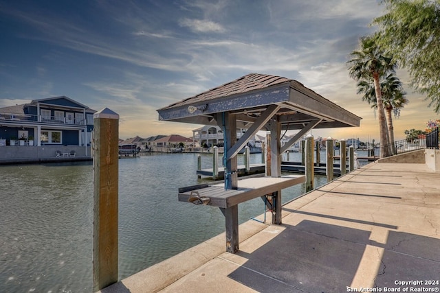 view of dock with a water view