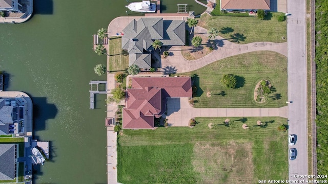 birds eye view of property featuring a water view