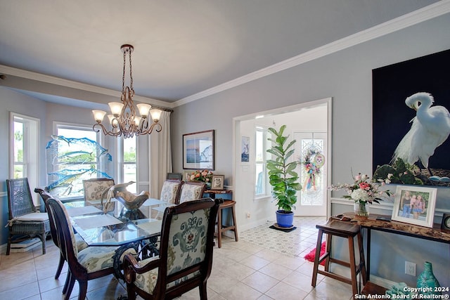 tiled dining space with crown molding and a chandelier