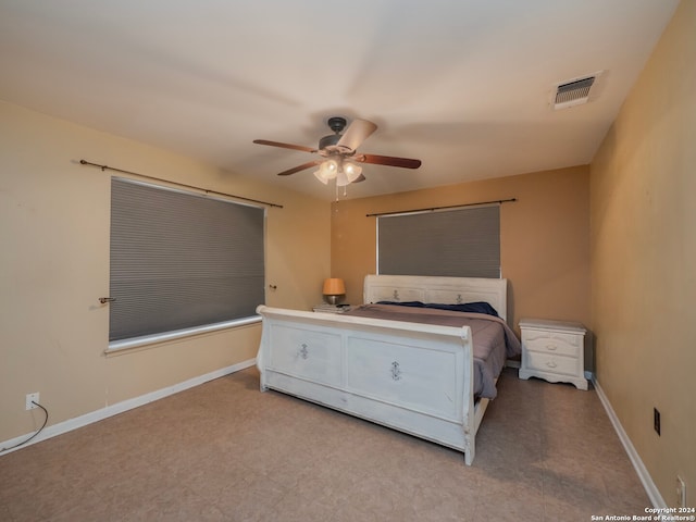 bedroom featuring ceiling fan