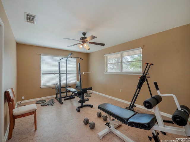 workout area featuring ceiling fan