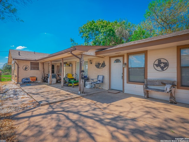 view of front of home with a patio