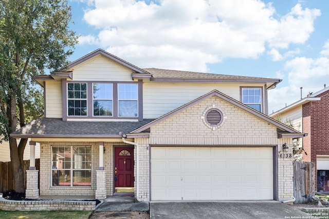 front of property with a garage