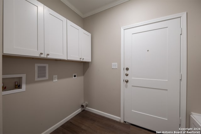 laundry area featuring cabinets, electric dryer hookup, dark hardwood / wood-style flooring, ornamental molding, and hookup for a washing machine