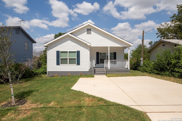 219 Gray St, San Antonio, TX 78208 - bungalow featuring a front yard and covered porch