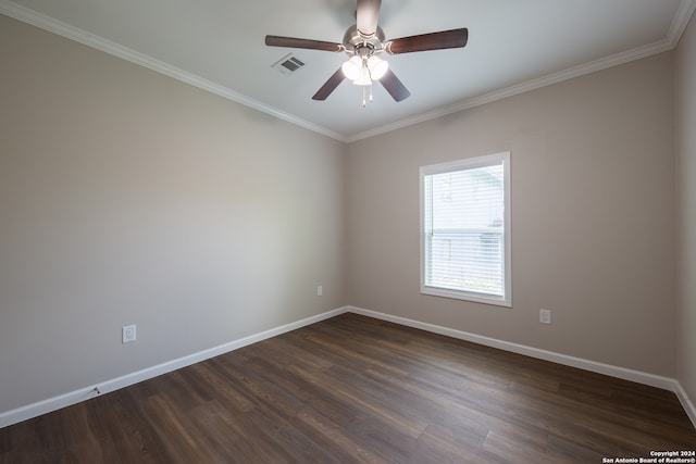 unfurnished room with crown molding, ceiling fan, and dark wood-type flooring