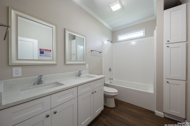 full bathroom featuring hardwood / wood-style flooring, shower / tub combination, crown molding, vanity, and toilet