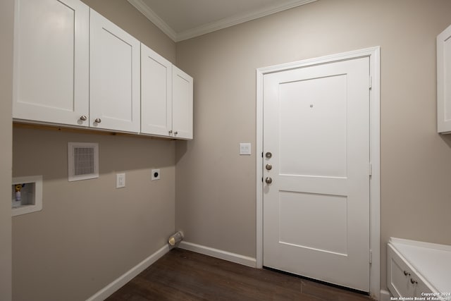 washroom featuring washer hookup, hookup for an electric dryer, cabinets, dark hardwood / wood-style floors, and crown molding