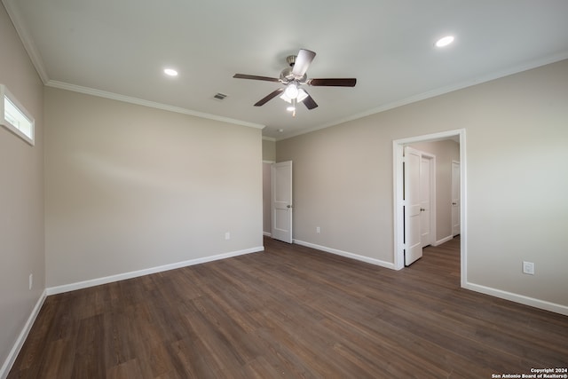 unfurnished bedroom with crown molding, dark hardwood / wood-style floors, and ceiling fan