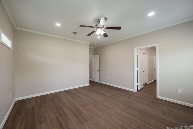 219 Gray St, San Antonio, TX 78208 - spare room featuring baseboards, a ceiling fan, dark wood-type flooring, and visible vents
