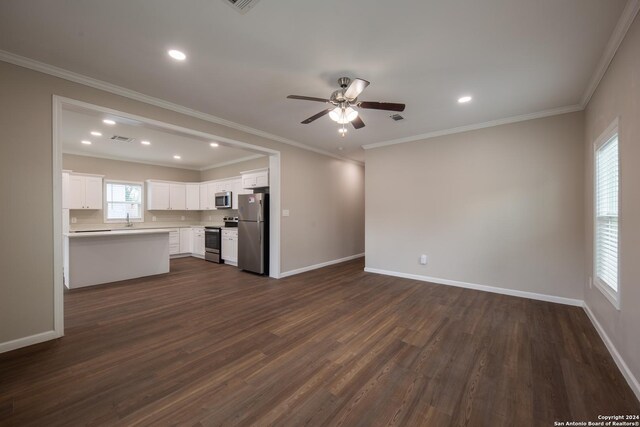 219 Gray St, San Antonio, TX 78208 - unfurnished living room with baseboards, a ceiling fan, dark wood-type flooring, and recessed lighting
