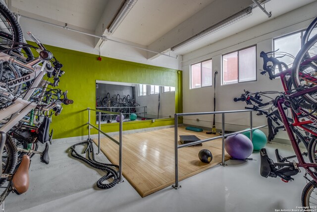 workout room featuring concrete flooring