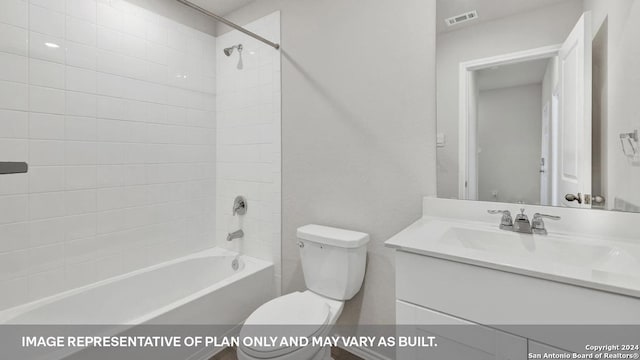 bathroom featuring toilet, vanity, visible vents, and bathing tub / shower combination