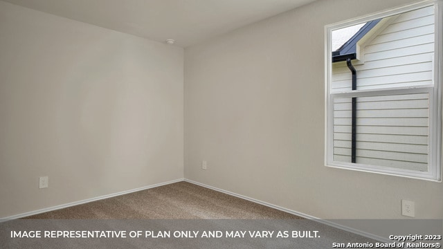 view of carpeted spare room