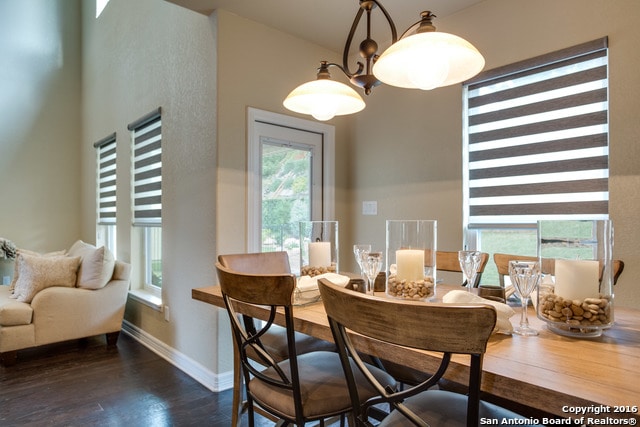 dining area featuring dark hardwood / wood-style floors