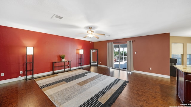 bedroom with ceiling fan, access to exterior, and dark hardwood / wood-style flooring