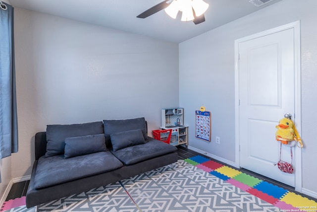 living room with ceiling fan