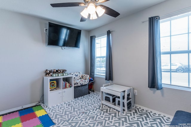 recreation room featuring ceiling fan